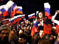 Crimea separates from Ukraine returns to Russia referendum 2014 happy people celebrations crowd Russian flags